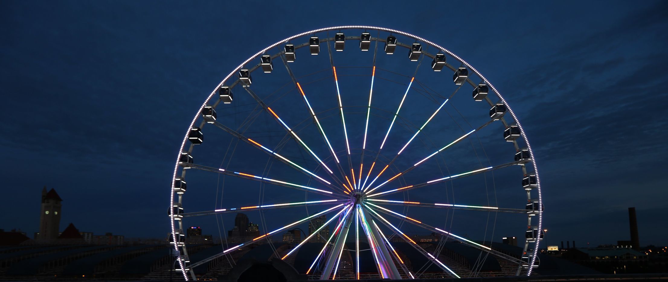 The St. Louis Wheel at Union Station lights up the sky